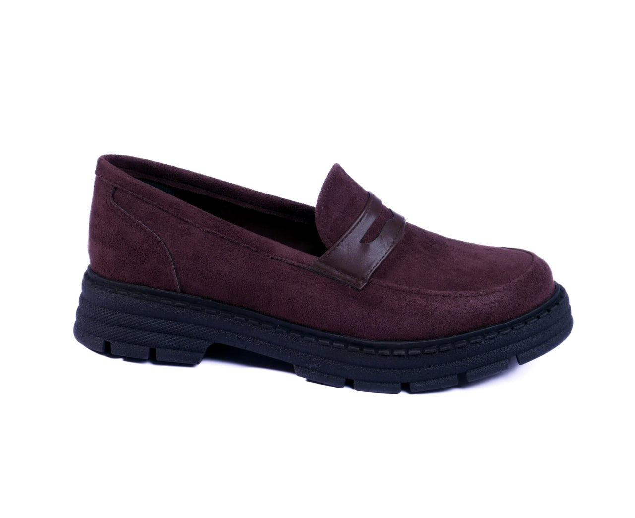 Brown suede chunky loafers with a black lug sole.