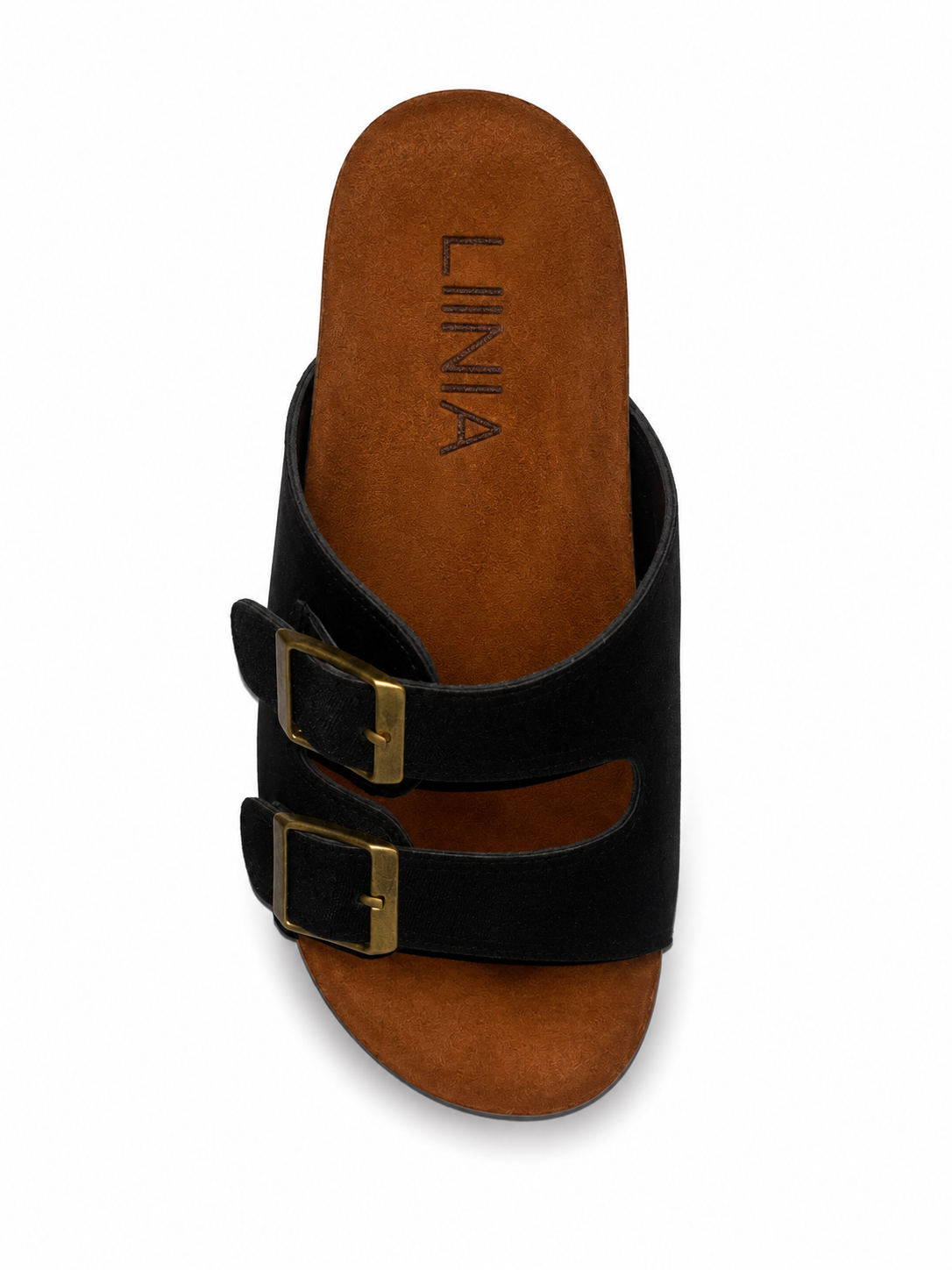 A single black double-strap slide sandal with gold-tone buckle details, shown from a top-down view on a white background. The footbed is brown suede with the brand name 'LINIA' printed vertically.