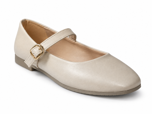 A single light beige Mary Jane flat shoe with a gold buckle strap, shown from a three-quarters angle on a white background.